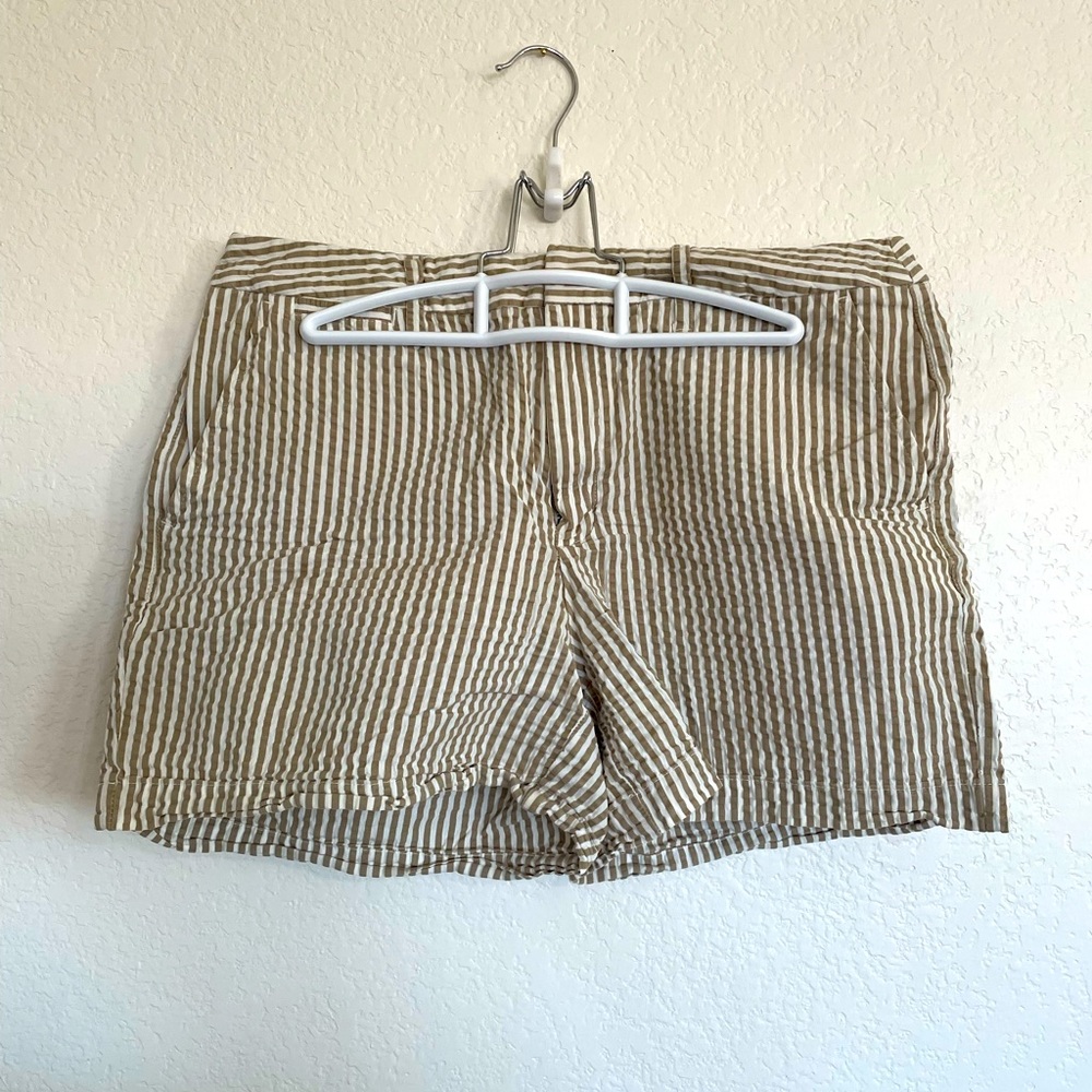 Tan pin striped shorts, a new day, size 8. Good condition.